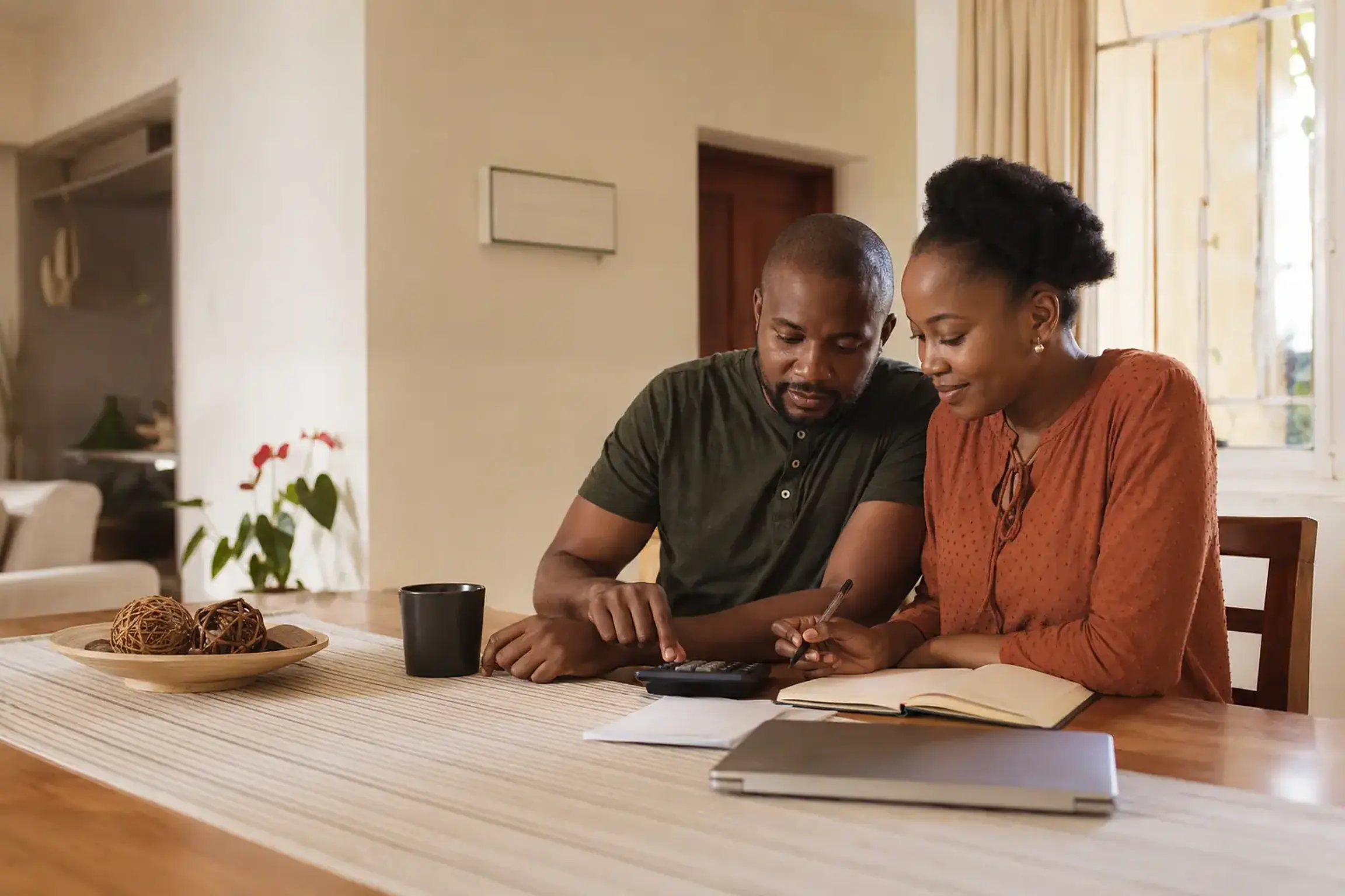 Kenyan family discussing financial plans